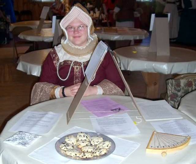 Northern Lights, 2005, with my embarrassing early garb. I entered an herbal sleep pillow, excellent small cakes, and a quadrant.